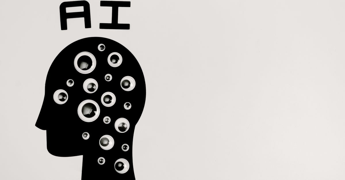 An illustration of a head in profile filled with many eyes, under the letters A I